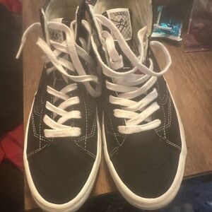 Vans Black and White High-Top Sneakers